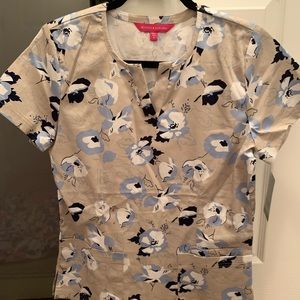 Brand new scrub top. Paid 30$. Tags are still on
